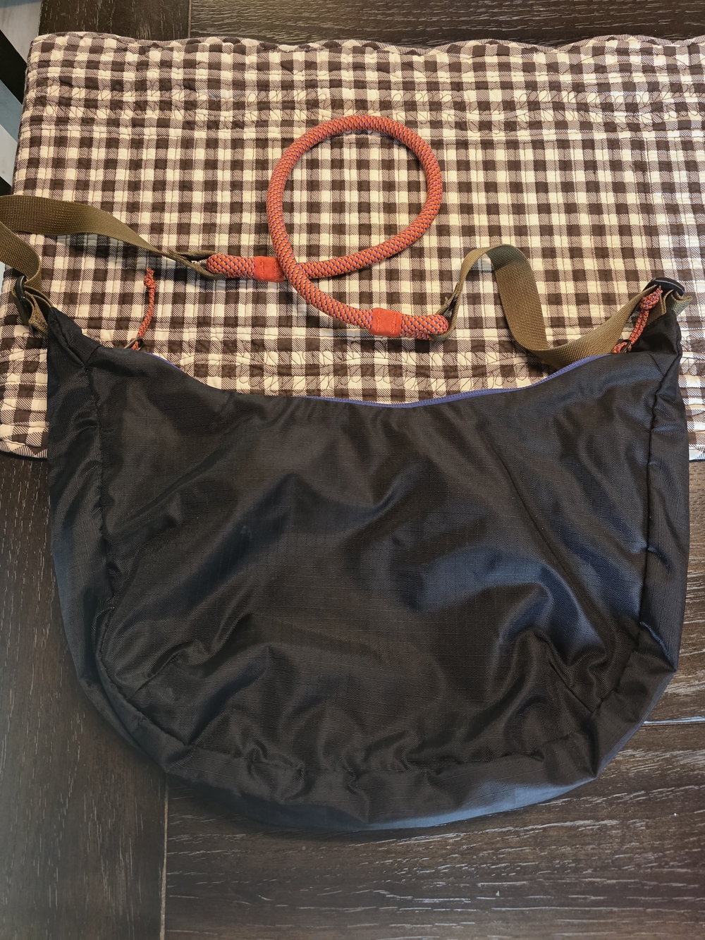 Cotopaxi Black Crossbody Sling Bag with Orange Accent - Picture 2 of 3